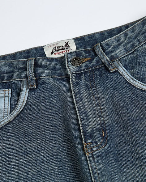 The Contour Taper Denim Jeans