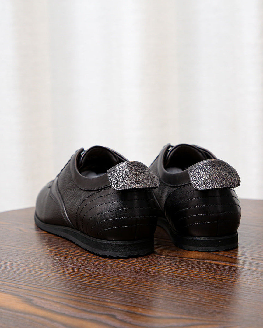 The Executive Leather Low Sneaker